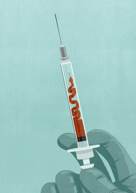 Syringe with a Red Ribbon