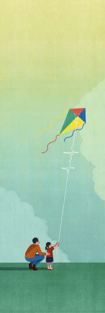 Father and Child Flying a Kite