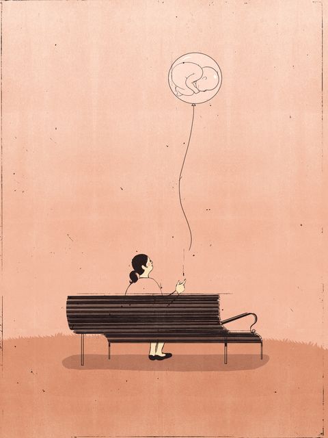 Woman on a Bench with an Embryo Balloon