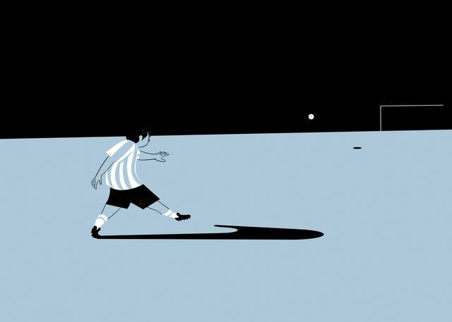 Footballer Kicking at Night